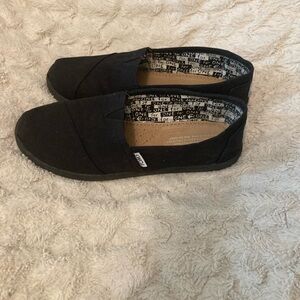 TOMS Classic Black Slip-ons